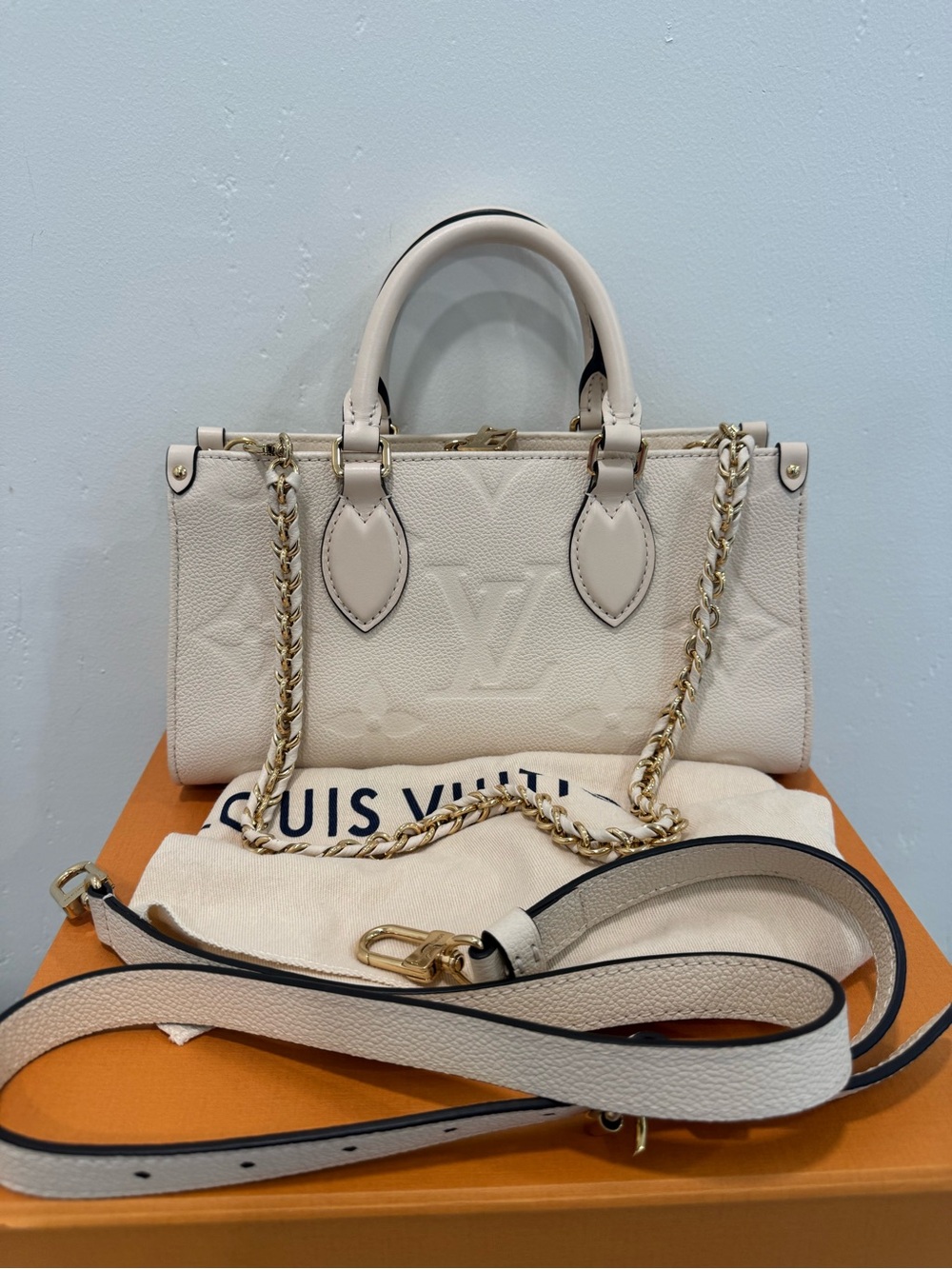 Louis Vuitton OnTheGo East West empreinte Cream tote